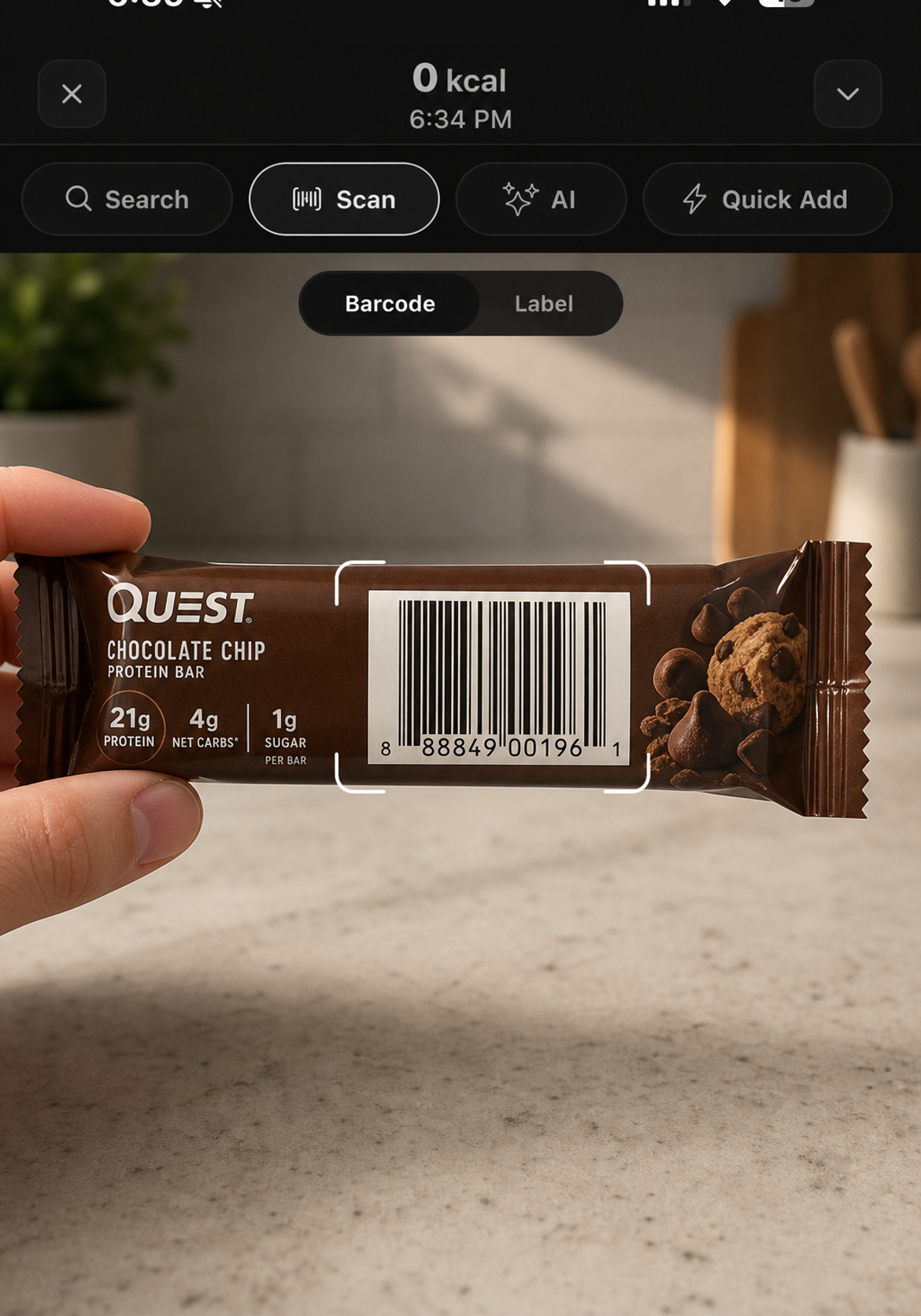 Nutoro barcode scanner aimed at a protein bar barcode
